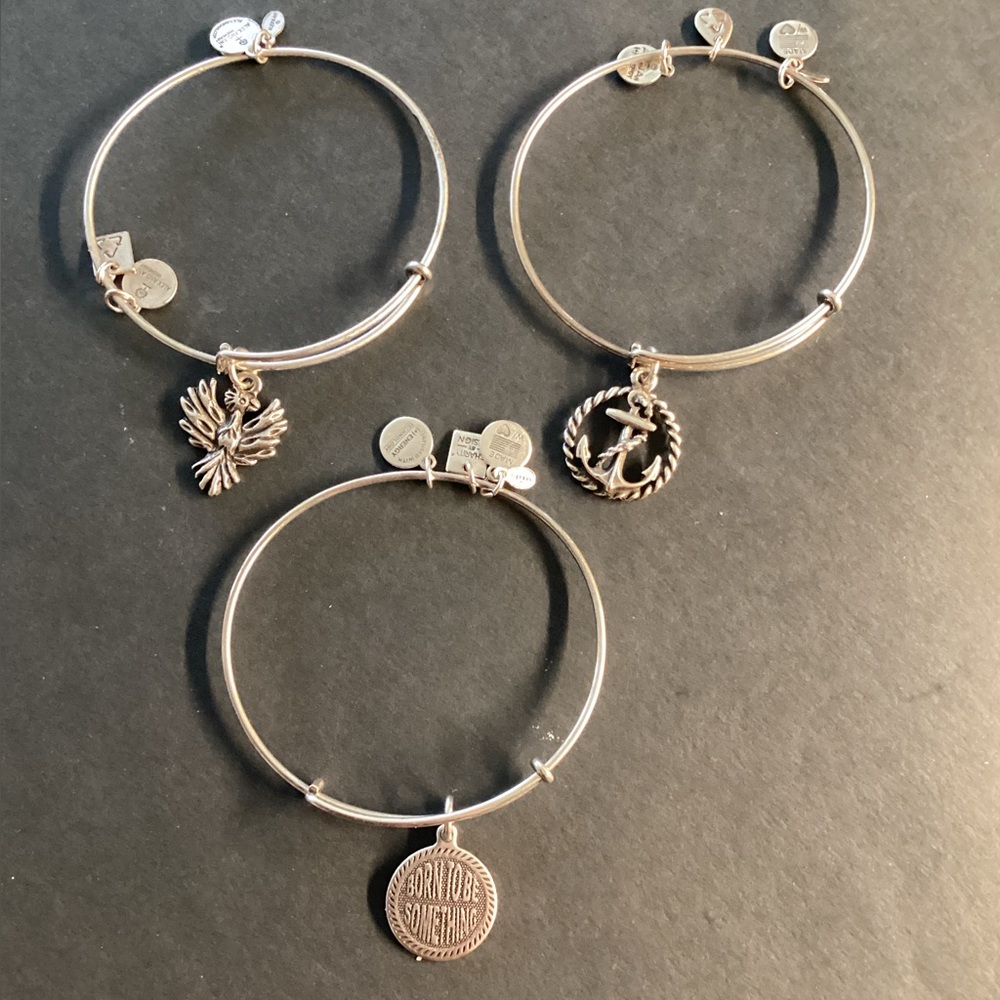 3 bracelets Alex and Ani charm. Nautical Anchor Born to Something and Phoenix.